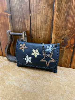 Kurtmen Raelyn Clutch, black leather clutch, petite fold over bag, metallic star purse, designer leather handbag, crystal accent clutch, artisanal leather bag, luxury evening clutch.